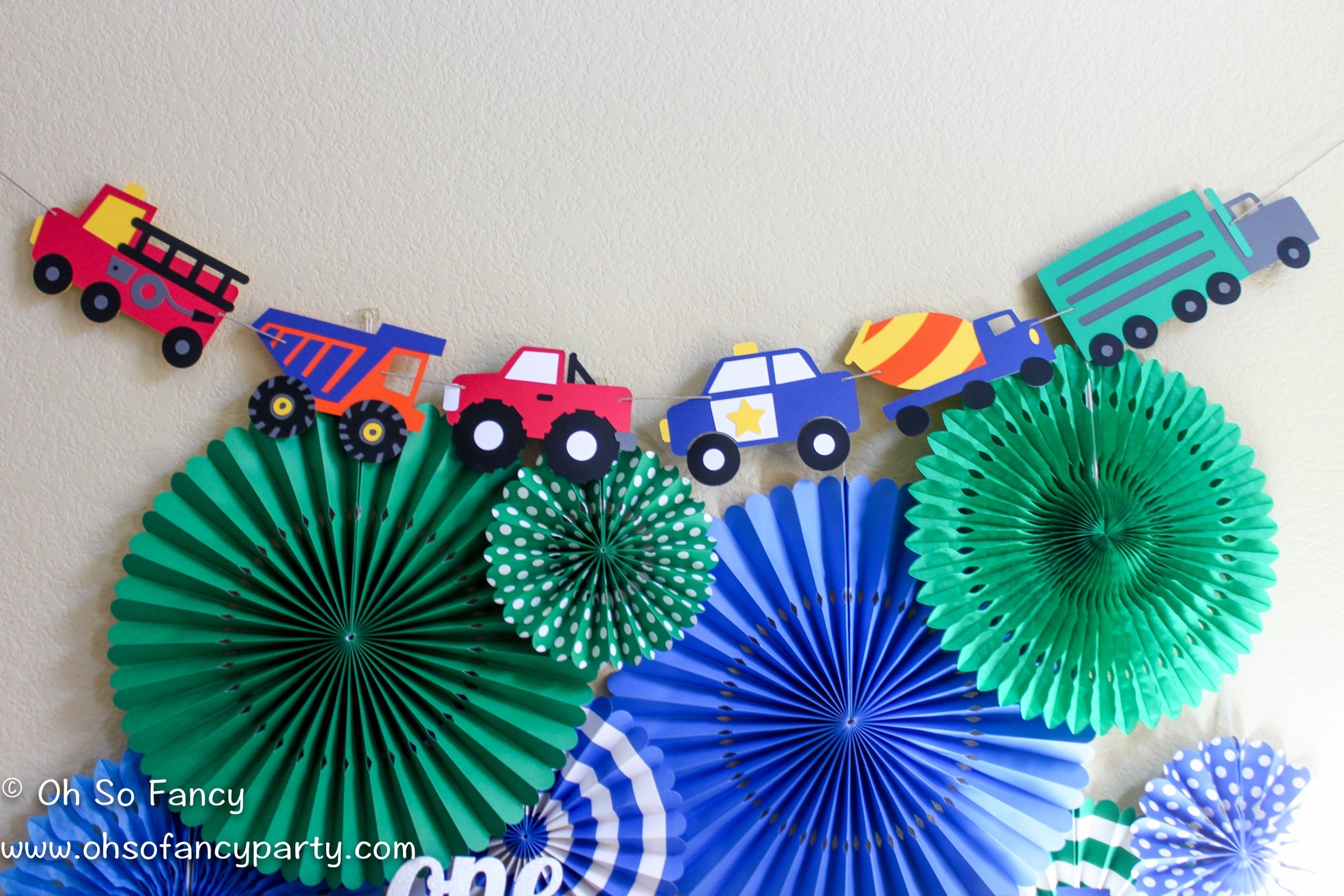 From birthday banners with trucks and race cars, to centerpieces and cupcake toppers to complete your table design, Oh So Fancy Party has it here for you.