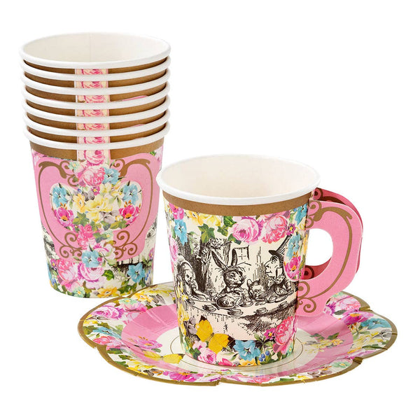 Set of floral-patterned cups and saucers on a white background