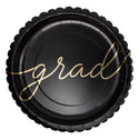 Black paper plate with 'grad' written in gold on a white background