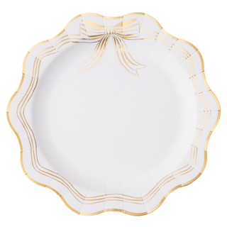 White paper plate with gold decorative edge on a white background