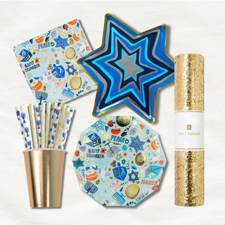 Hanukkah party bundle with foil plates, napkins, gold cups, mixed menorah and starburst straws, and gold table runner | Oh So Fancy Party