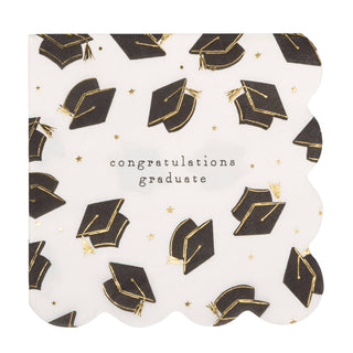 Graduation-themed paper napkins with black caps and gold accents on a white background, featuring the text 'Congratulations graduate'.