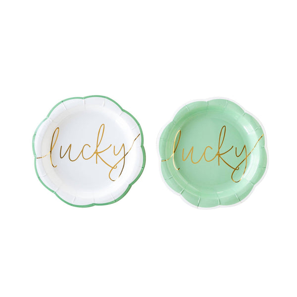 Two round green plates with 'lucky' text on a white background