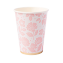 Paper cup with pink floral pattern on a white background