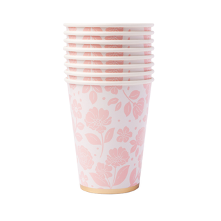 Set of paper cups with pink floral pattern on a white background