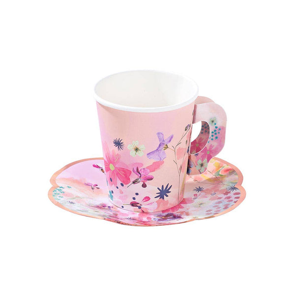 Floral teacup and saucer set on a white background