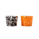 Two Halloween-themed cupcake liners, one with a skeleton design and the other with orange stars on a white background.