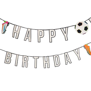 Happy Birthday banner with soccer-themed decorations on a white background