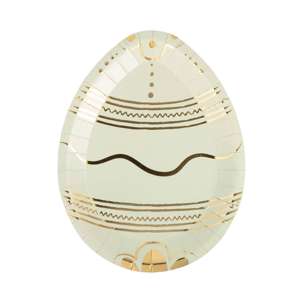 Decorative egg with gold patterns on a white background