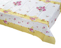 Floral tablecloth with yellow border on a white background