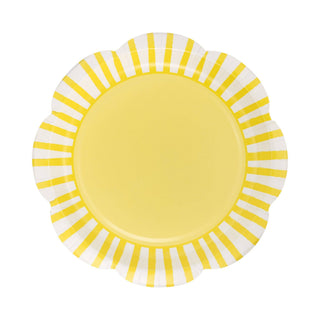 Yellow plate with white stripes on a white background