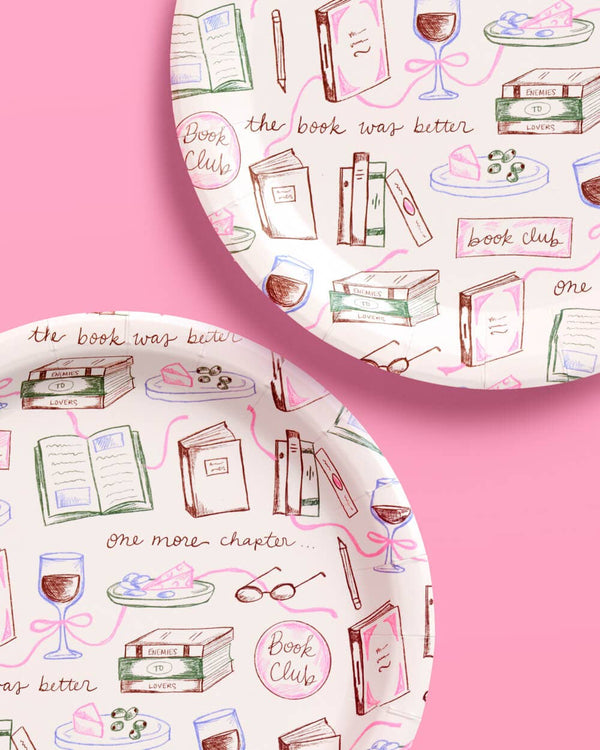 Patterned paper with book-themed illustrations on a pink background