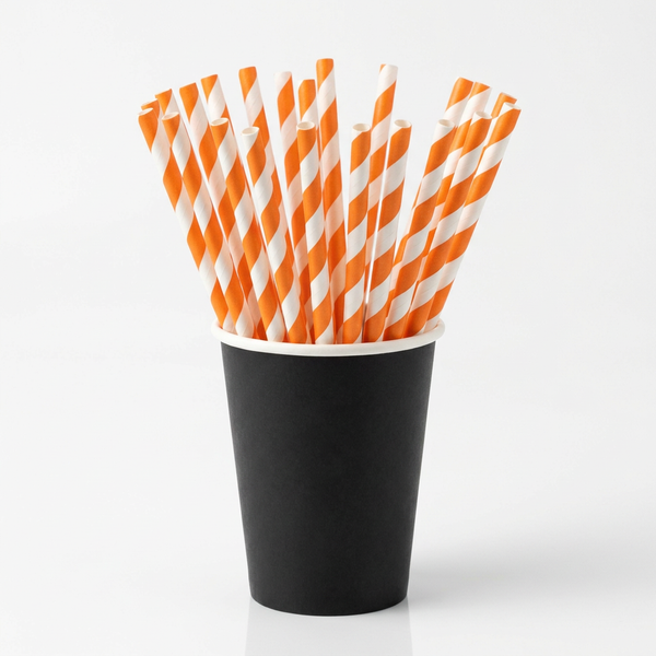 Black paper cup holding 20 orange-and-white striped straws