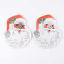 Black Santa and White Santa vintage St. Nick paper plates lying flat side by side