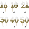 Set of number candles on sticks with gold and white design.