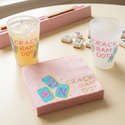Crack Bam Dot napkins with matching frosted cups on a mahjong party table
