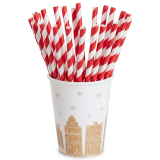 Gingerbread cup with 20 red-and-white striped straws standing inside