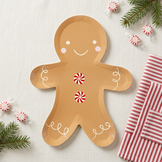 Gingerbread man paper plate with festive tabletop styling