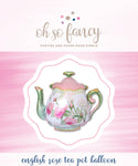 Tea pot balloon with floral design on a pink watercolor background, featuring 'oh so fancy' branding.