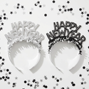 New Year’s Eve tiaras lying flat on a table