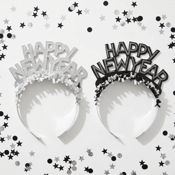 New Year’s Eve tiaras lying flat on a table