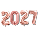 Rose gold foil number balloons spelling 2027 on white