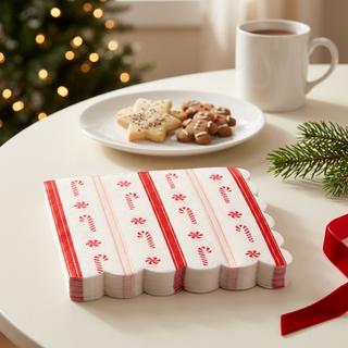 Styled Christmas peppermint napkins on a festive dessert table