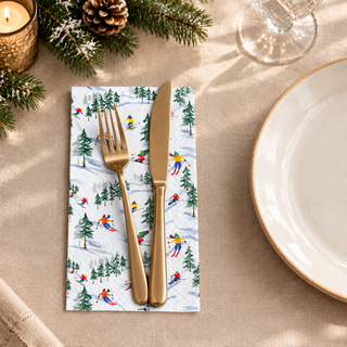 Winter place setting with utensils on the Down The Slope napkin