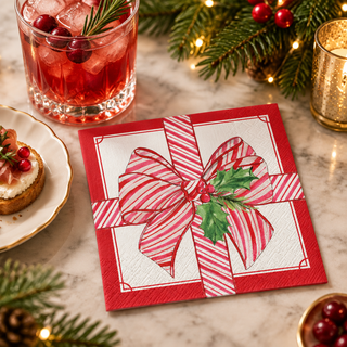 Wrapped In Christmas Spirit napkin at a holiday drinks table